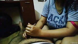 Wife Giving Handjob to Husband